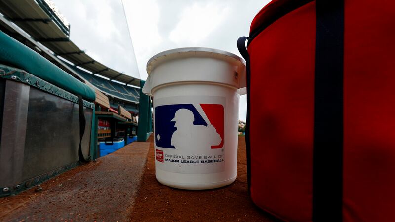 ANAHEIM, CA - MAY 08: Detailed view of the MLB logo on a baseball bucket prior to a regular...