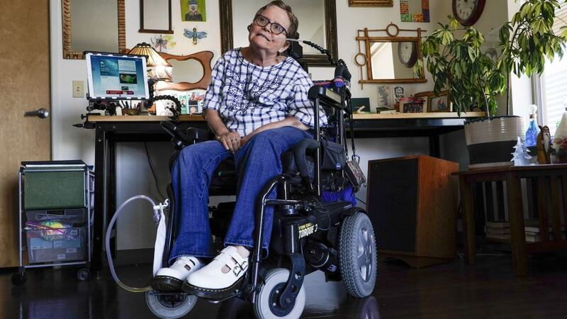 Martha Chambers pose in her apartment Friday, Sept. 2, 2022, in Milwaukee.