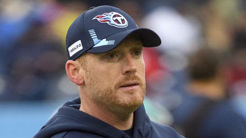 FILE - Tennessee Titans offensive coordinator Todd Downing watches during warm ups before an...