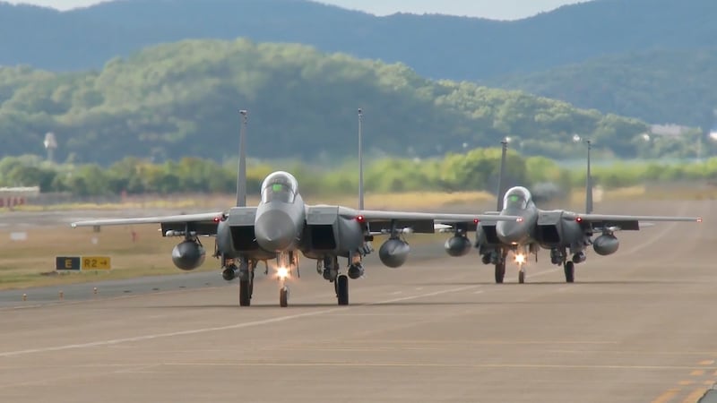 FILE - In this image taken from video, South Korean Air Force's F15K fighter jets prepare to...